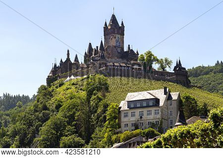 Cochem, Germany, June 13, 2021. Beautiful View Of The Hilltop Castle (reichsburg Cochem) In The Tour