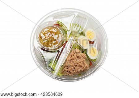 Fresh Tuna Salad With Lettuce, Cucombers, Cherries And Eggs In Plastic Container.  Top View.