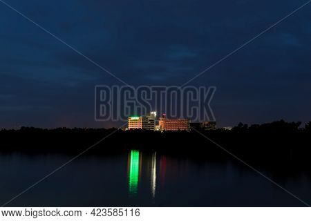 Picture Of The Empty Area Of The Building View At Dusk That We Look At From Afar With Blue Sky