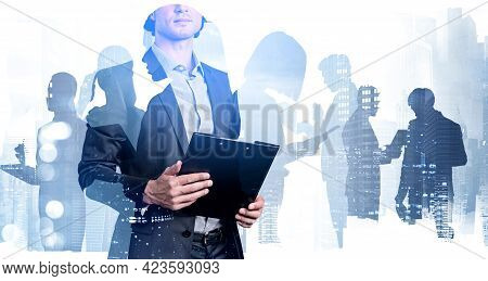 Office Man In Business Suit Holding Documents, Toned Image, Double Exposure Of Business Buildings. C