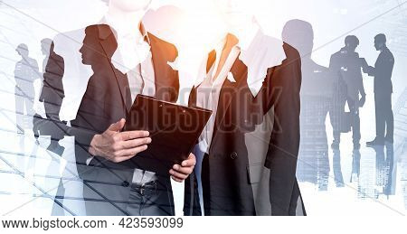 Office People Holding Business Files, Documents, Double Exposure Of Business Buildings And Silhouett