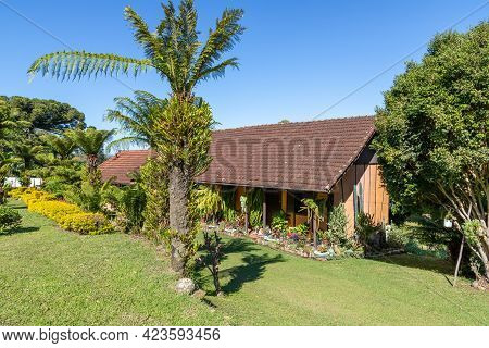 Small House And Garden With Grass, Flowers, Trees And A Dog, Pnhal Alto, Nova Petropolis, Rio Grande