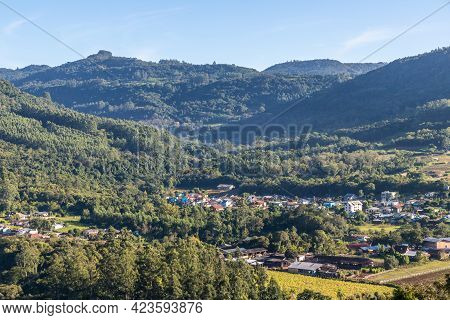 Village Around Forest And Mountains