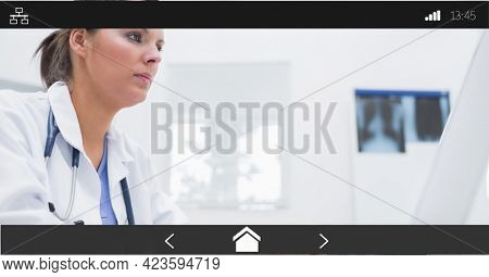 Composition of female doctor using computer on digital image interface screen. medical and healthcare services communication digital interface concept digitally generated image.