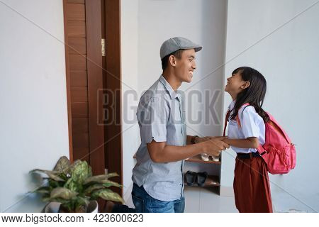 Back To School. Asian Pupil With Primary Student Uniform Getting Ready To School