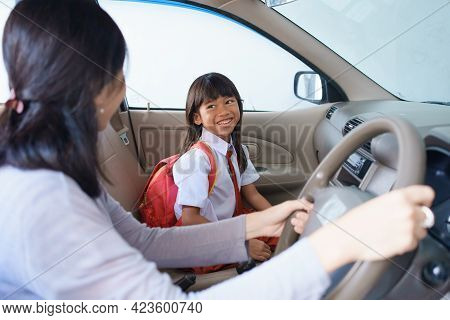 Back To School. Asian Pupil With Primary Student Uniform Getting Ready To School