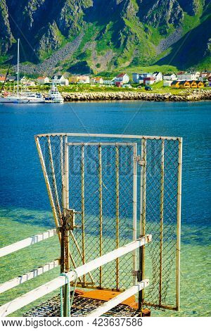 Fishing Port Old Pier And Gate With Bleik Village Houses In The Background. Andoya Island, Vesterale