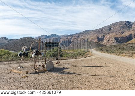 Seweweekspoort, South Africa - April 7, 2021: Name Board At Nietvoorby Farm On The Road Between Sewe