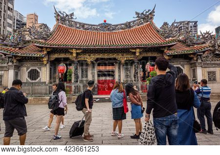 Taipei, Taiwan - October 20th, 2019: famous attraction of Lungshan temple at Taipei, Taiwan