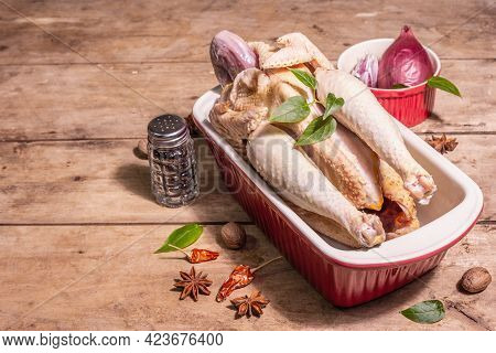 Raw Whole Chicken Carcass For Healthy Food Lifestyle With Traditional Chinese Spices In Ceramic Baki
