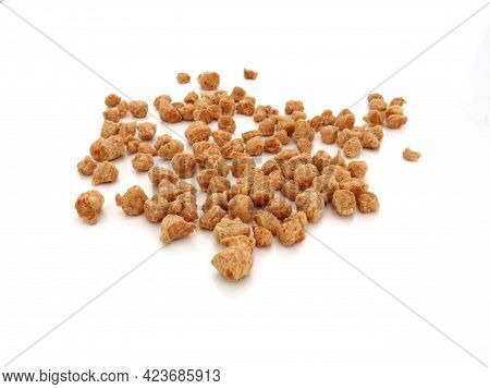 Bulk Coarse Textured Soybeans On White Background. Legume And Vegetarian Food. Close Up Of Vegetable