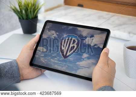 Alanya, Turkey - May 11, 2021: Man Hand Holding Apple Ipad Air Space Gray With Multinational Enterta
