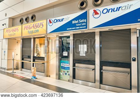 Closed Pegasus Airlines And Onur Air Ticket Sale Offices At Airport. Antalya Airport, Turkey - Janua