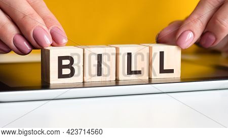 Word Bill Made With Wood Building Blocks, Stock Image