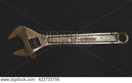 Steel Silver Wrench With Dark Background Black