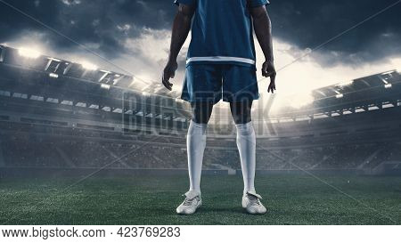 Cropped Portrait Of Male Soccer, Football Player Standing Posing At The Stadium Before Sport Match O