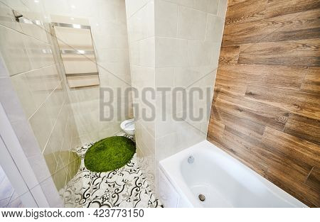 View Of Left Part Of Small Light Bathroom With Modern Renovation. White Tiles On The Walls Combining