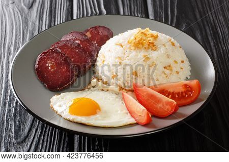 Sinangag Is A Filipino Version Of Fried Rice With Garlic, Ham And Egg Close Up In The Plate On The T