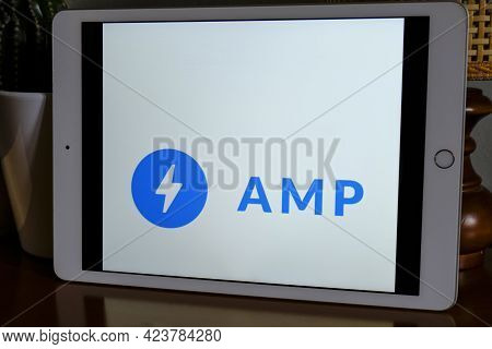 May 2021 Milan, Italy: Amp Company Logo Icon Close-up On Tablet Screen In Office. Amp Illustrative B