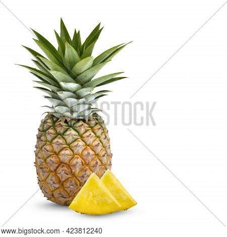 Whole Pineapple And Pineapple Slice. Pineapple With Leaves Isolate On White. Full Depth Of Field .
