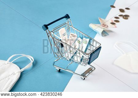 Cost Of Shnelltest, Express Corona Test In German Language. Shopping Cart With Covid 19 Antigen Test