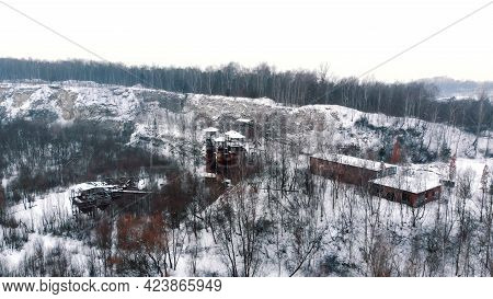 Drone View Of Liban Quarry Kamieniolom In Krakow, Poland During The Winter Season. Old Rusty Machine