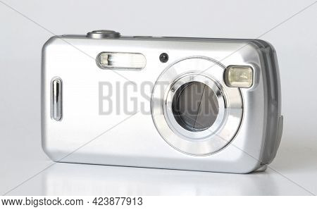 Old Digital Camera Isolated, Obsolete And Not In Use Anymore, Dusty And Dirty