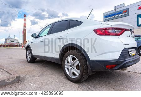 Samara, Russia - June 13, 2021: Renault Arkana Vehicle  Parked Up On The City Street In Summer Day