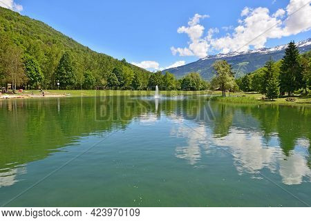 Beautiful View Of A Lake In A Leisure Park Of The Valley Of The Tarentaise In The French Alps