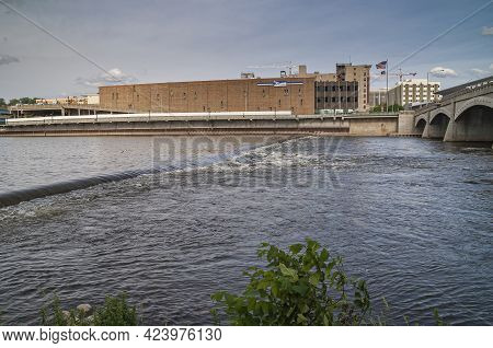 Grand Rapids, Mi, Usa - June 7, 2008: Brown Brick Large Postal Service Sorting Center Along River At