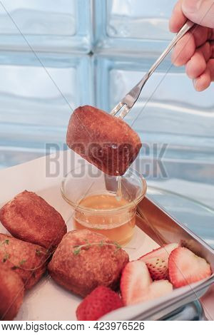 Traditional French Beignets Doughnuts With Strawberry And Powdered Sugar.