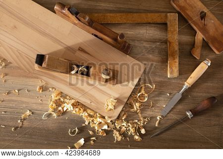 Woodworking tools on wooden table. Wood working or joiner tool as still life. Carpentry workshop