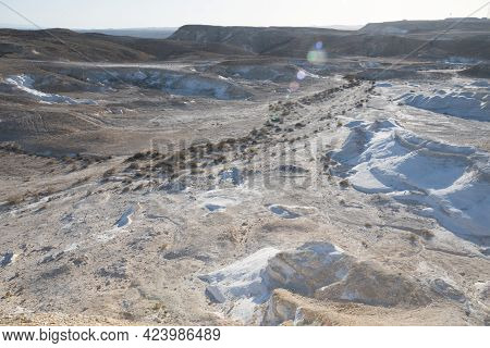 Beautiful Lunar Landscape. Wight And Smooth Hills In Various Shapes In A Desert Landscape. The Whiti