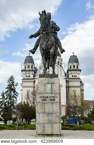 Targu Mures, Transylvania, Romania - April 23, 2021:  Avram Iancu Statue And Ascension Of The Lord, 
