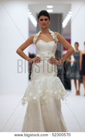ZAGREB, CROATIA - OCTOBER 12: Fashion model in wedding dress made by Lorien on 'Wedding Expo' show in the Westgate Shopping City in Zagreb, Croatia on October 12, 2013