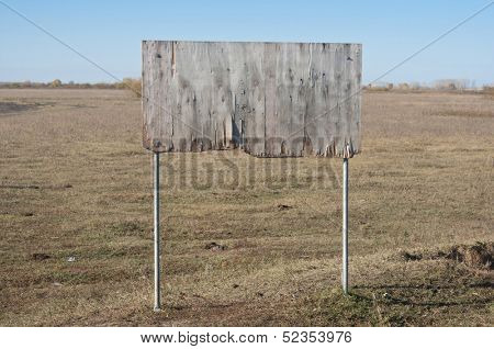 Wood sign with blue sky