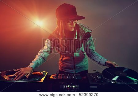 Hiphop dj woman playing at nightclub party lifestyle