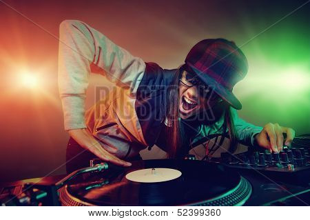 Hiphop dj woman playing at nightclub party lifestyle