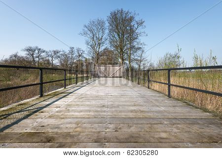 Wooden Gate At The And Of A Bridge