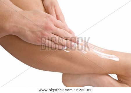 Bein mit Hand anziehen lotion
