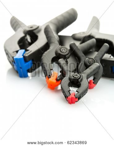 Plastic clamps on white background
