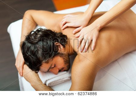 Man having a massage in a wellness center