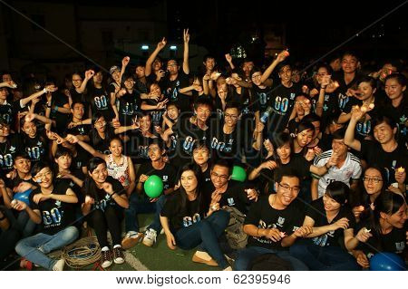 Young Volunteer Raise Hand