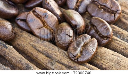 Coffee Beans On Wood Background