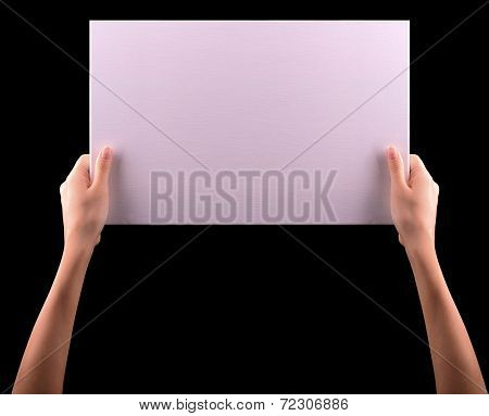 Hands holding big blank paper banner