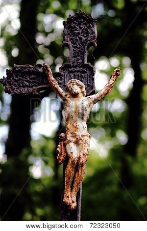 Old brokenness cross with crucifix