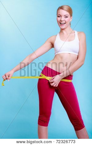Fitness Woman Fit Girl With Measure Tape Measuring Her Loins