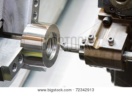 Industrial Metal Work Machining Process By Cutting Tool On Cnc Lathe