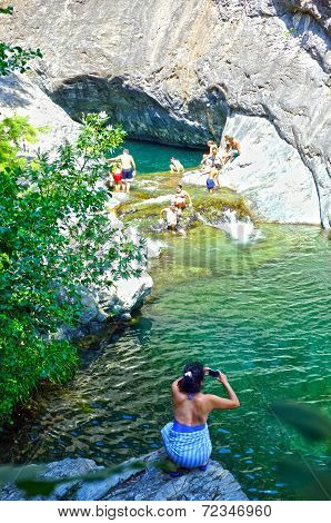 People swimming in nature