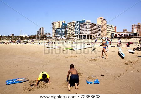 Many People And Paddle Ski's On Addington Beach